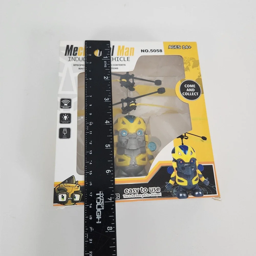 Mechanical Man Induction Vehicle NO.5058 Yellow Blue Flying Robot Toy USB Charge